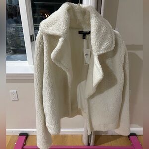 Never worn white jacket, cute for going out on a winter night or a snowy getaway